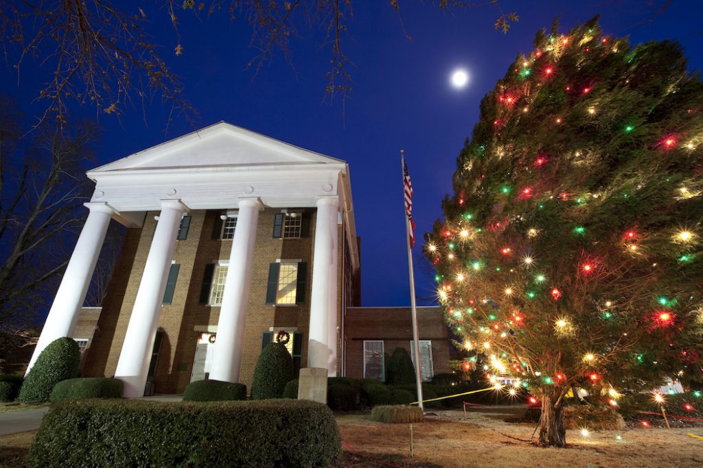 Courthouse with large Christmas tree outside