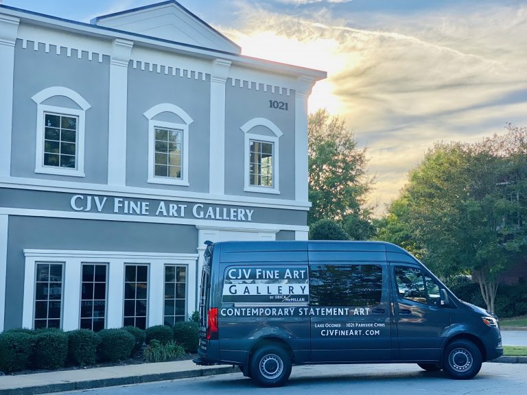 An exterior photo of CJV Fine Art Gallery with their van in front.
